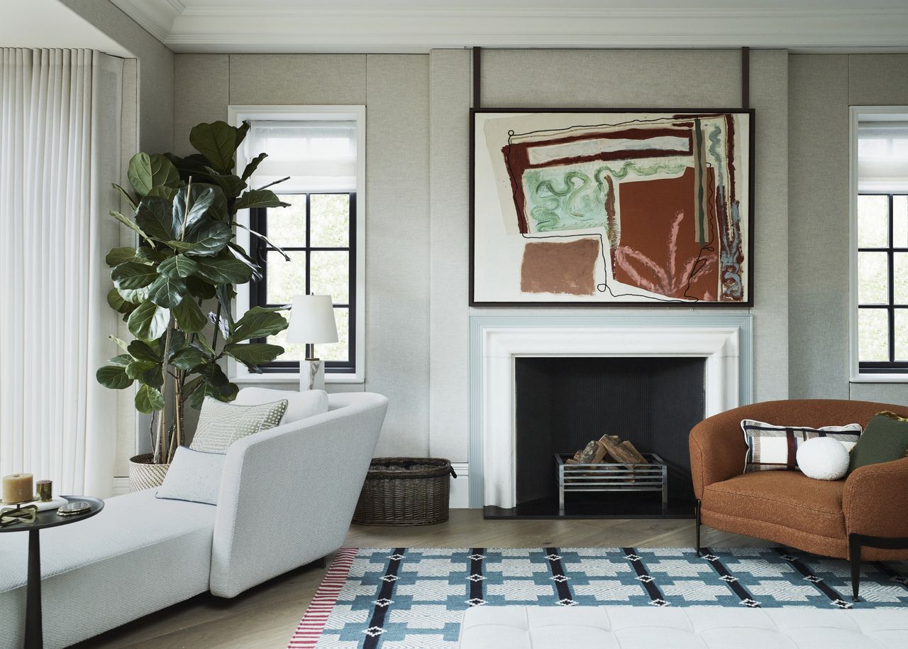 Irene Gunter's living room with favorite artwork which hides her tv