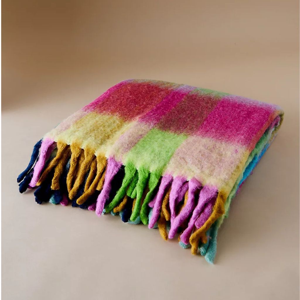 The Cosy Cocooned Fringed Throw from Anthropologie