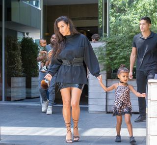 Kim Kardashian and Kanye West with children are seen leaving their hotel on August 29, 2016 in New York City.
