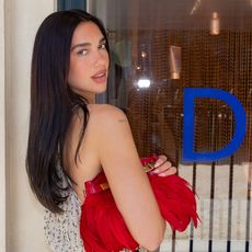Dua Lipa wears a sequin wrap mini skirt - summer 2026