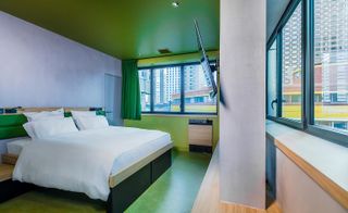 Yooma Paris - green bedroom