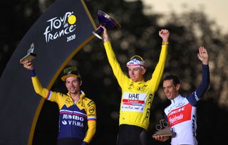 PARIS FRANCE SEPTEMBER 20 Podium Primoz Roglic of Slovenia and Team Jumbo Visma Tadej Pogacar of Slovenia and UAE Team Emirates Yellow Leader Jersey Richie Porte of Australia and Team Trek Segafredo Celebration Trophy Mask Covid safety measures during the 107th Tour de France 2020 Stage 21 a 122km stage from MantesLaJolie to Paris Champslyses TDF2020 LeTour on September 20 2020 in Paris France Photo by Tim de WaeleGetty Images