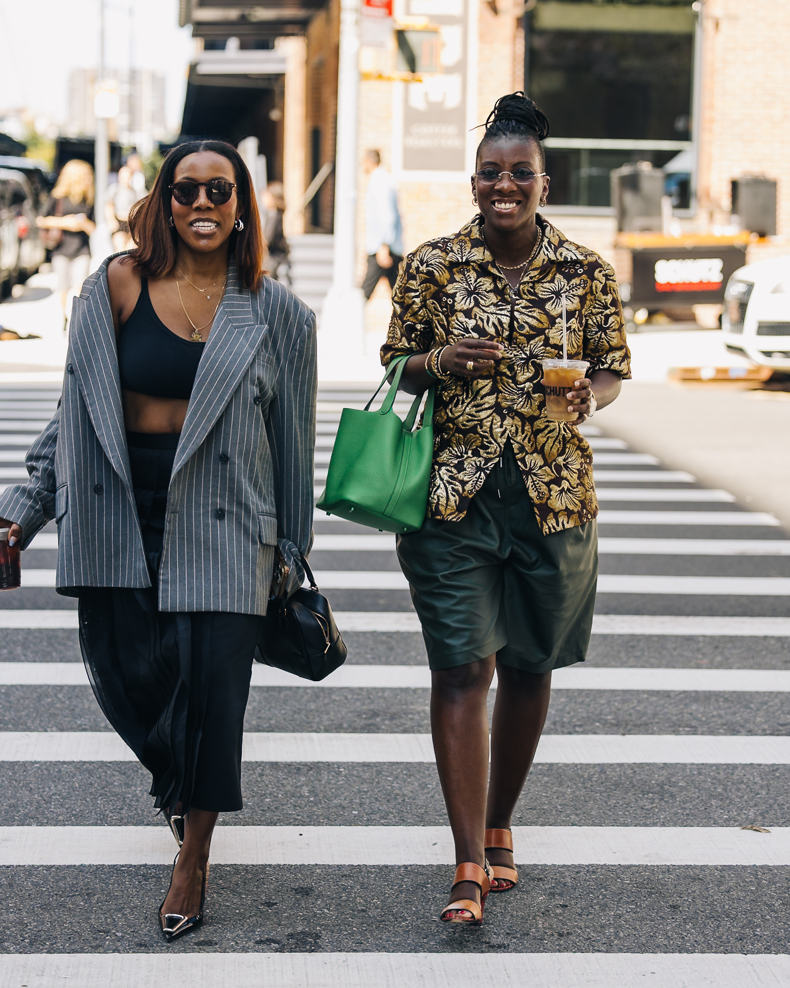 picture of Nikki Ogunnaike wearing a floral shirt and leather shorts