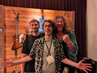 (from left) GW.com's Matt Owen and Michael Astley-Brown, pictured with Jared James Nichols at the 2025 NAMM Show in Anaheim, California