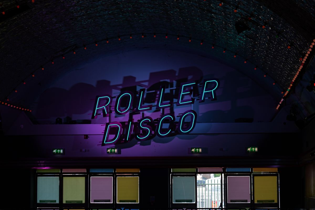A reading roller disco in neon