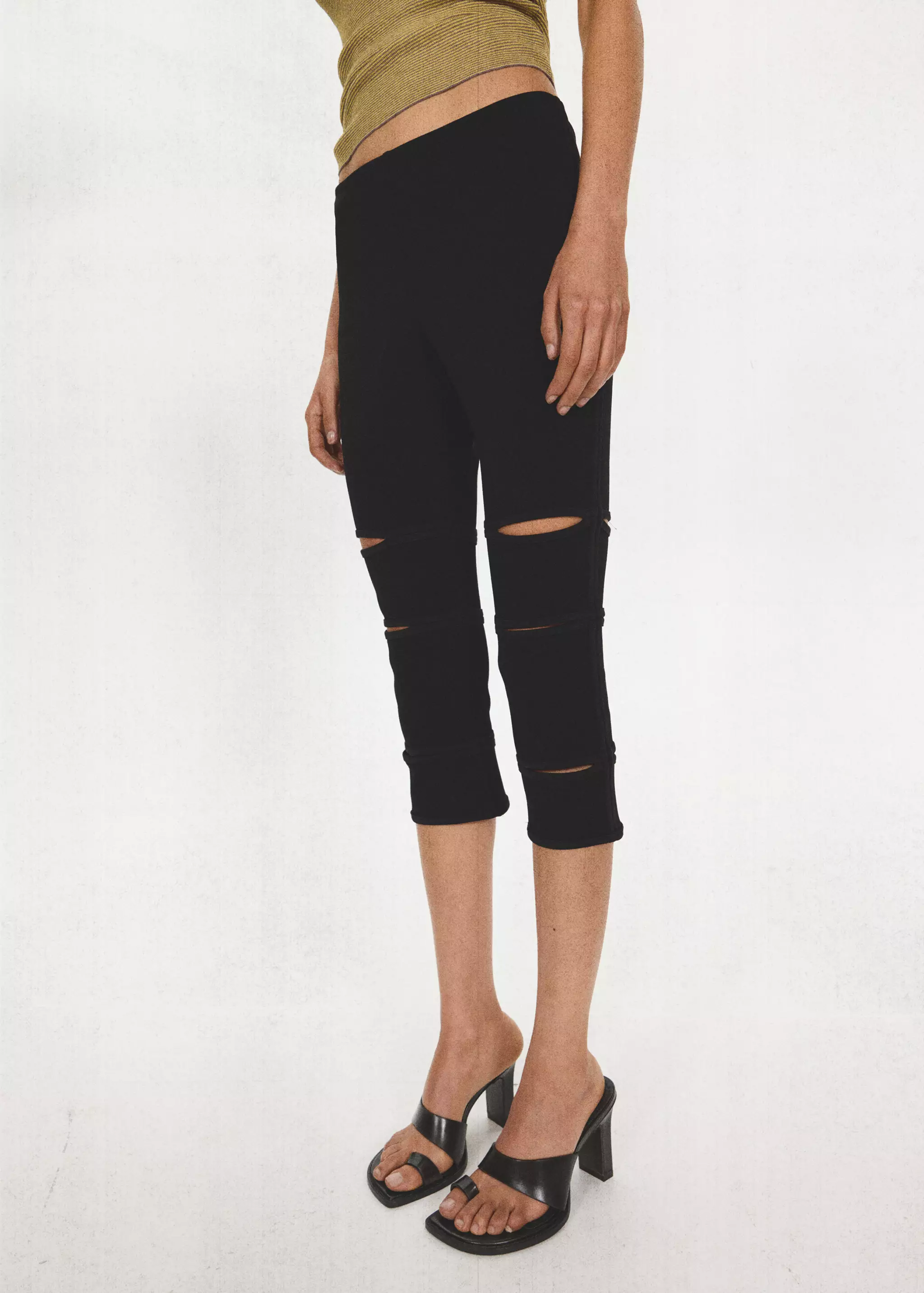 Capri pants with cutouts - Women | Mango USA