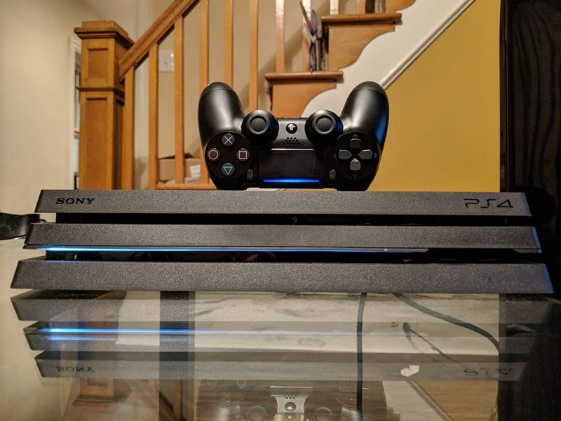 Can you play PlayStation 4 games while they |