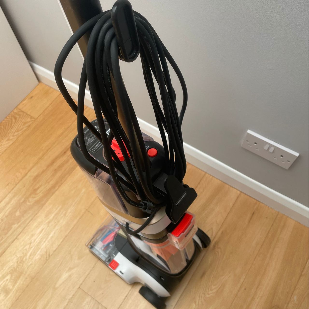 Shark CarpetForce Upright Carpet Cleaner from above, showing off the cord wrapped around the handle