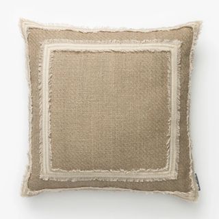 beige square pillow with cream detailing