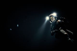 In National Geographic's "Mars" series, the astronauts' spacesuits are equipped with bright headlights. This comes in handy not just at nighttime, but also for exploring Mars' dark underground caves. Pictured here is Russian exobiologist and geologist Anamaria Marinca, played by Marta Kamen.