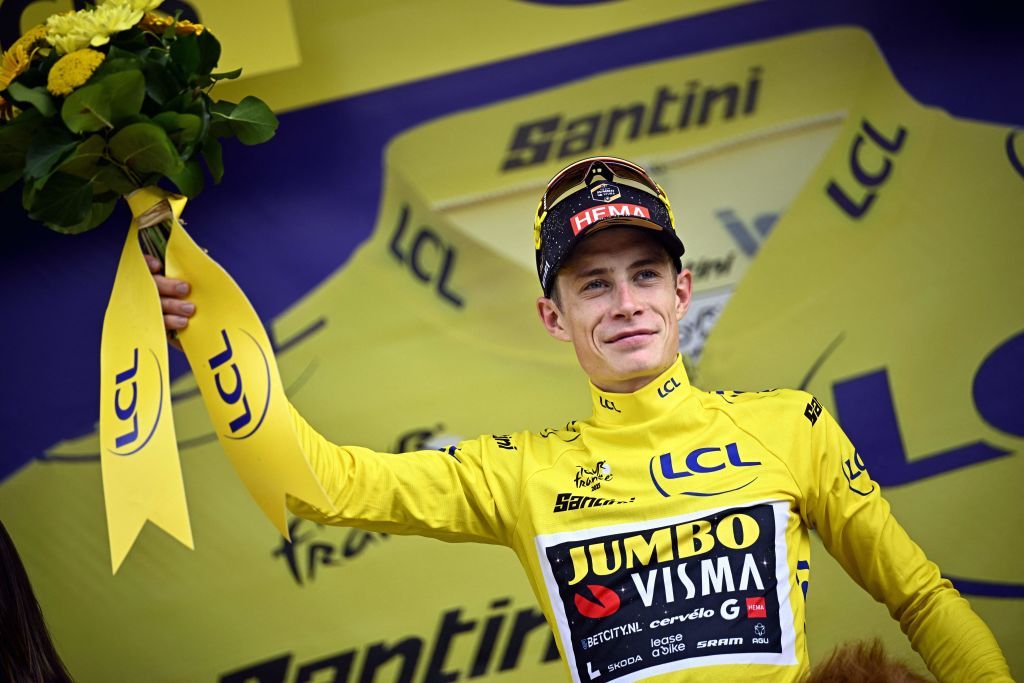 Danish Jonas Vingegaard of JumboVisma celebrates on the podium in the yellow jersey of leader in the overall ranking after stage 8 of the Tour de France cycling race a 2007 km race from Libourne to Limoges France Saturday 08 July 2023 This years Tour de France takes place from 01 to 23 July 2023 BELGA PHOTO JASPER JACOBS Photo by JASPER JACOBS BELGA MAG Belga via AFP Photo by JASPER JACOBSBELGA MAGAFP via Getty Images