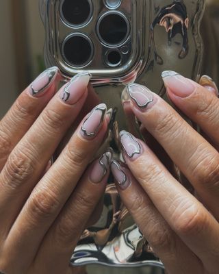 @nailartbyqueenie 3D silver nails