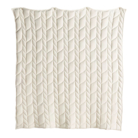 1. Cable-Knit Jersey Quilt:was from $228now $171.50 at Anthropologie