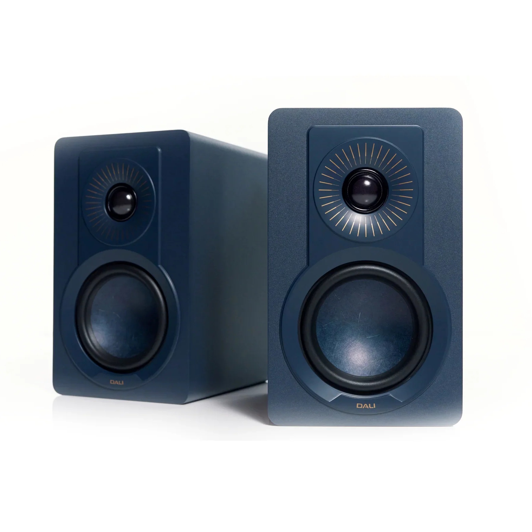 Dali Kupid bookshelf speakers in blue on a white background 
