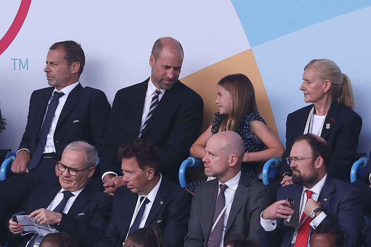 Prince William wears a suit and watches the Lionesses play against Spain alongside daughter Princess Charlotte
