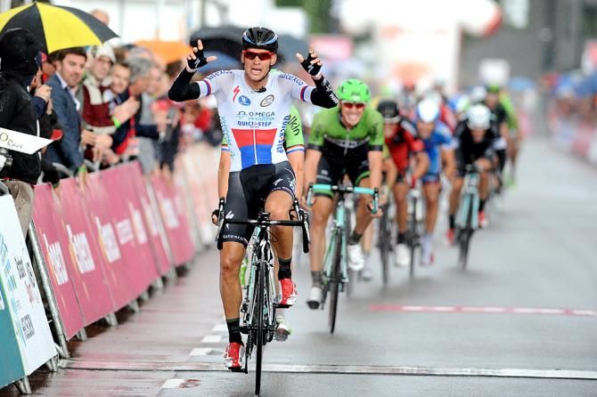 Zdenek Stybar (Omega Pharma-QuickStep) celebrates stage 2 victory in the wet