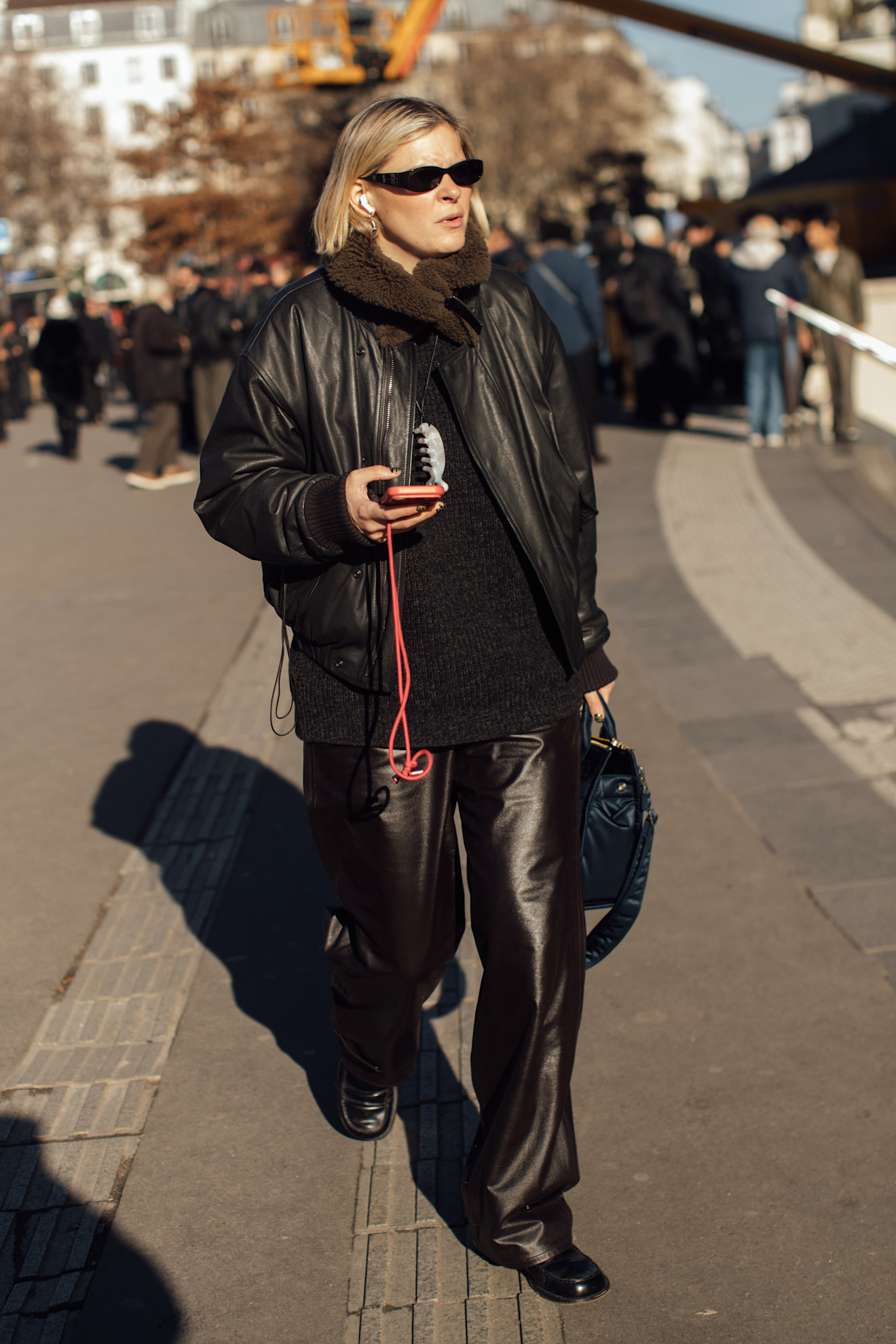 woman wearing leather pants in paris