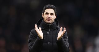 Arsenal manager Mikel Arteta applauds their fans after the Premier League match between Fulham FC and Arsenal FC at Craven Cottage on March 12, 2023 in London, England