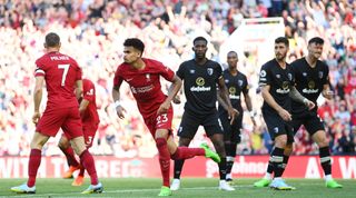 Luis Diaz of Liverpool celebrates after scoring their team's ninth goal during the Premier League match between Liverpool FC and AFC Bournemouth at Anfield on August 27, 2022 in Liverpool, England.