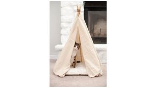 DIY cat bed jute teepee with tabby cat peaking out