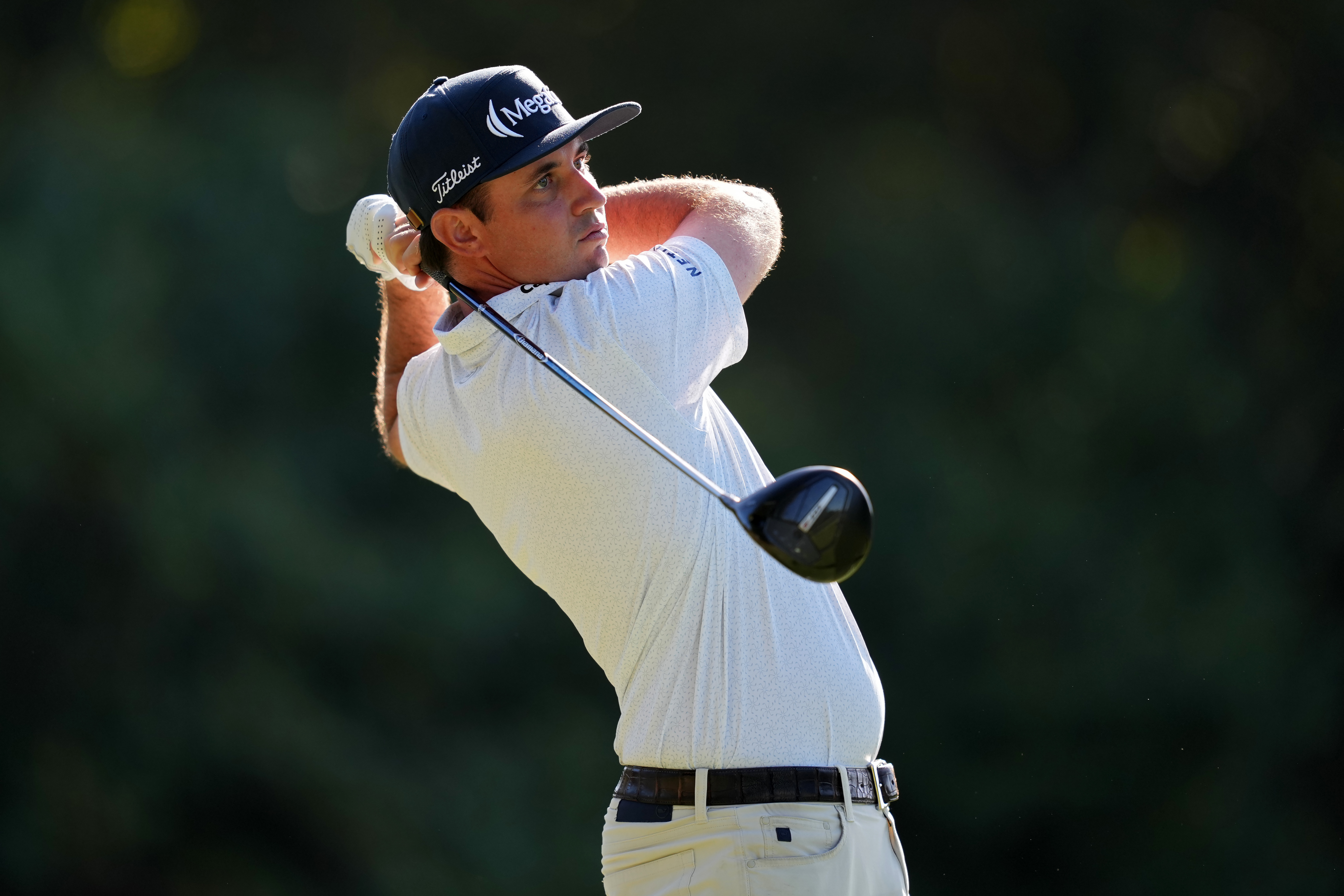 JT Poston hits a driver off the tee