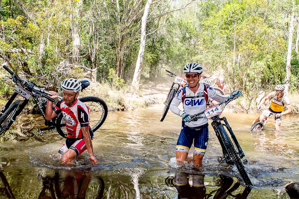 The surrounds get more tropical - Sarah White at a river crossing today.