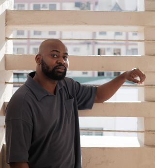 Olorunfemi Adewuyi, photographed by Stephen Tayo, on the rooftop of his office in Onikan, Lagos