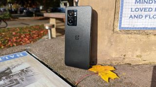 OnePlus Nord N300 5G leaning against a pillar