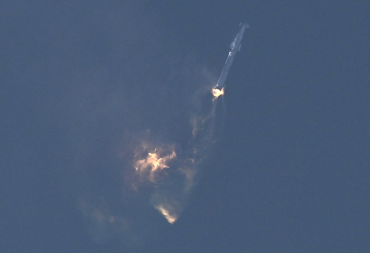 SpaceX's starship tumbles through the air while facing an issue during its first test flight on April 20, 2023