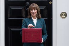 Rachel Reeves stands outside Number 11 Downing Street with Budget box on Autumn Budget day