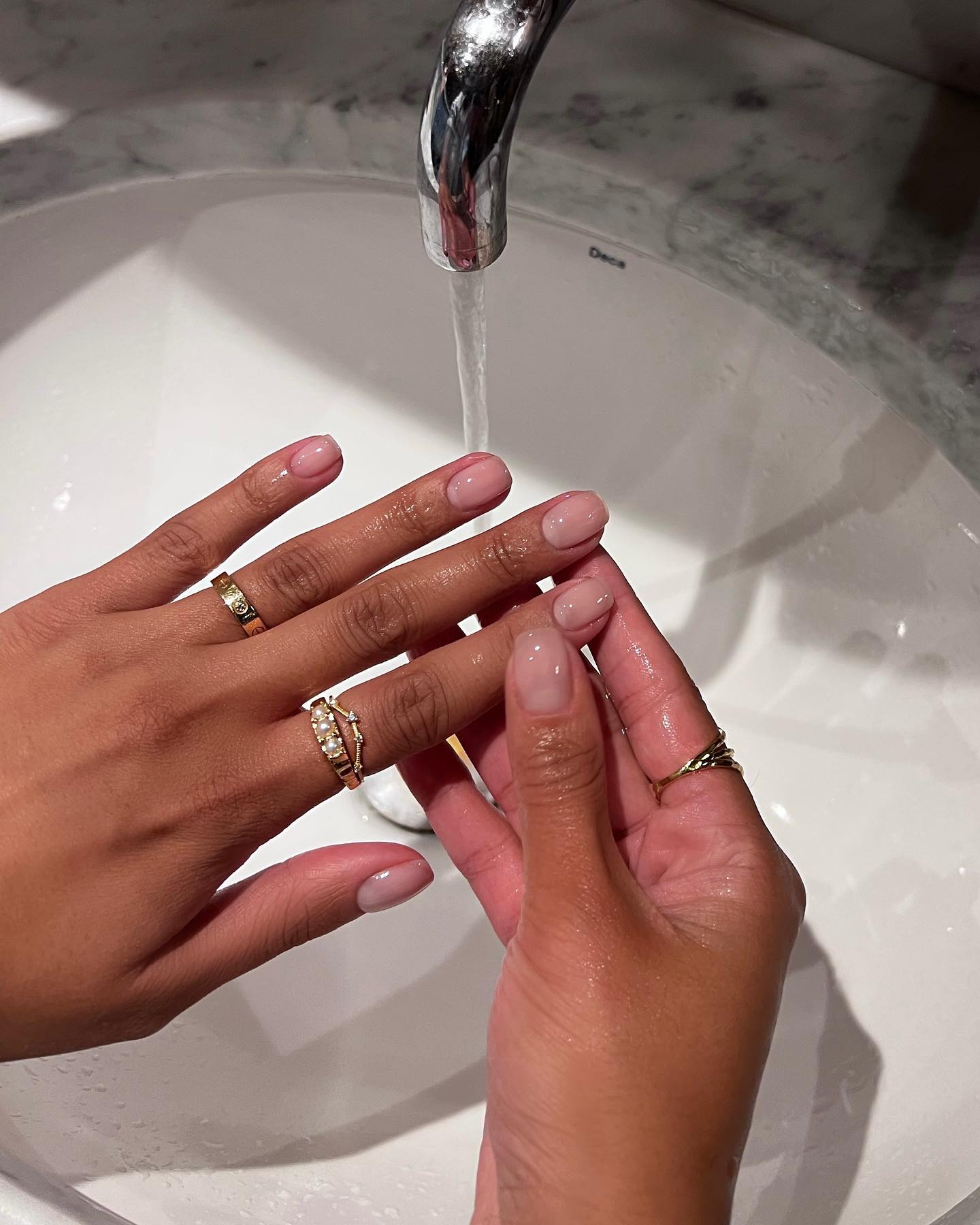 Sheer pink nails with OPI Bubble Bath polish