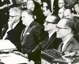 NASA administrators sit at the witness table before the Senate Committee on Aeronautical and Space Services, chaired by Senator Clinton P. Anderson, on the Apollo 1 (Apollo 204) accident. The individuals are (L to R) Dr. Robert C. Seamans, NASA Deputy Administrator; James E. Webb, NASA Administrator; Dr. George E. Mueller, Associate Administrator for Manned Space Flight, and Maj. Gen. Samuel C. Phillips, Apollo Program Director.
