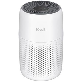 A white cylindrical levoit air purifier