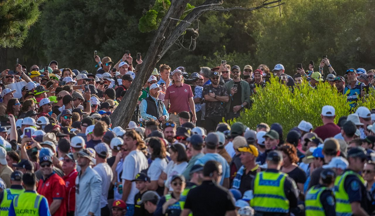 Cameron Smith hits a shot amongst the crowds at LIV Golf Adelaide