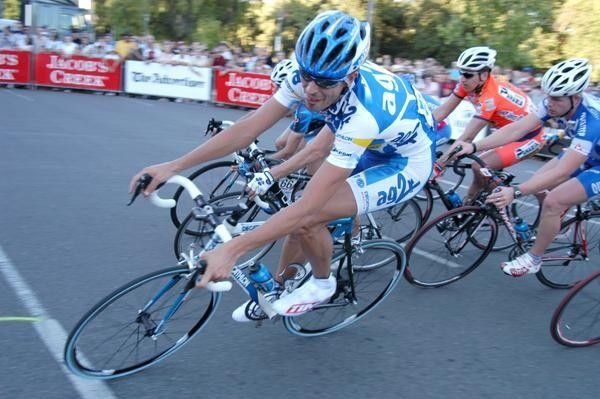 An Ag2r Prevoyance rider concentrates hard whilst negotiating the tight hairpin corner