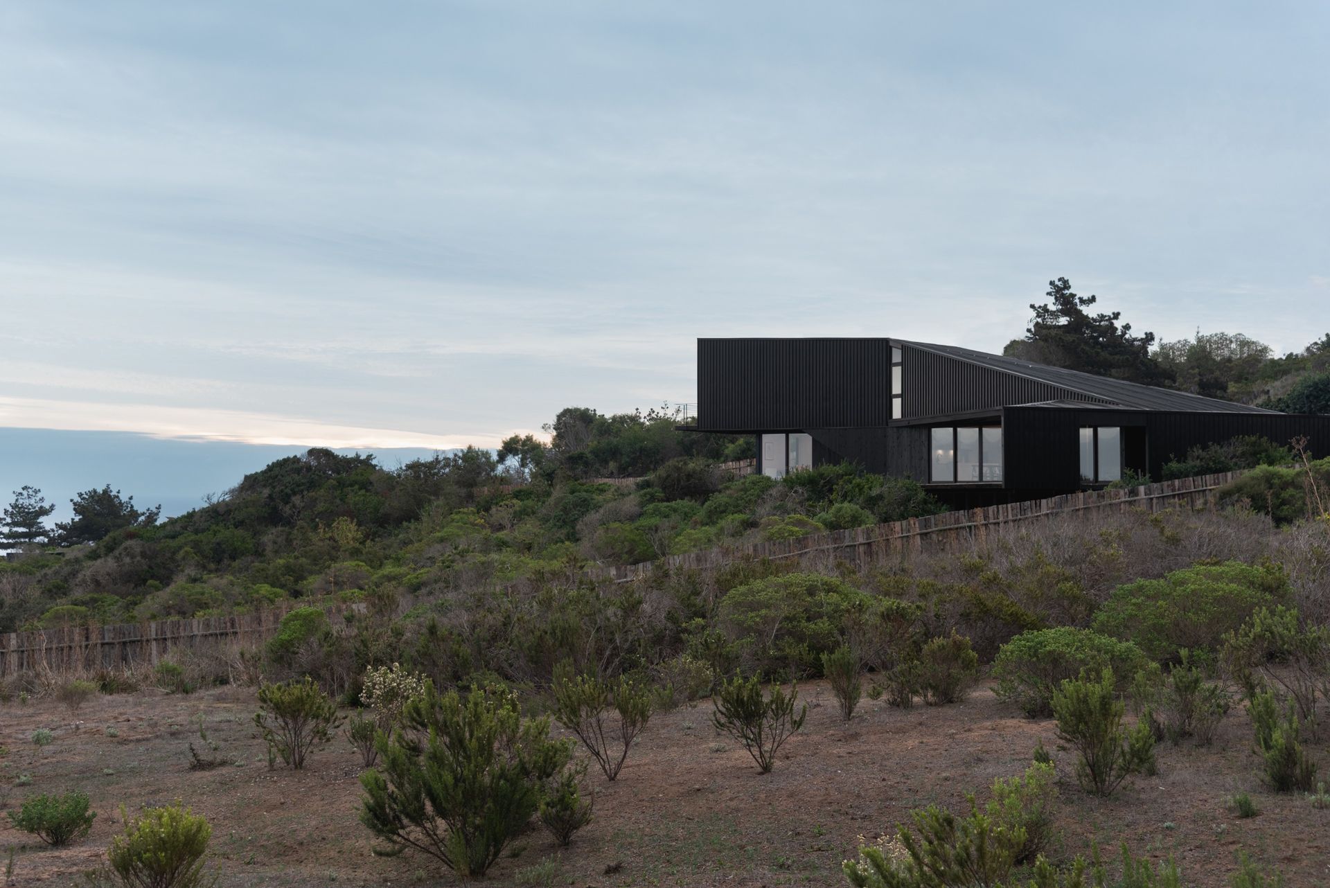 Casa Asomada by Whale!, a chilean house jutting out from a cliff towards the landscape