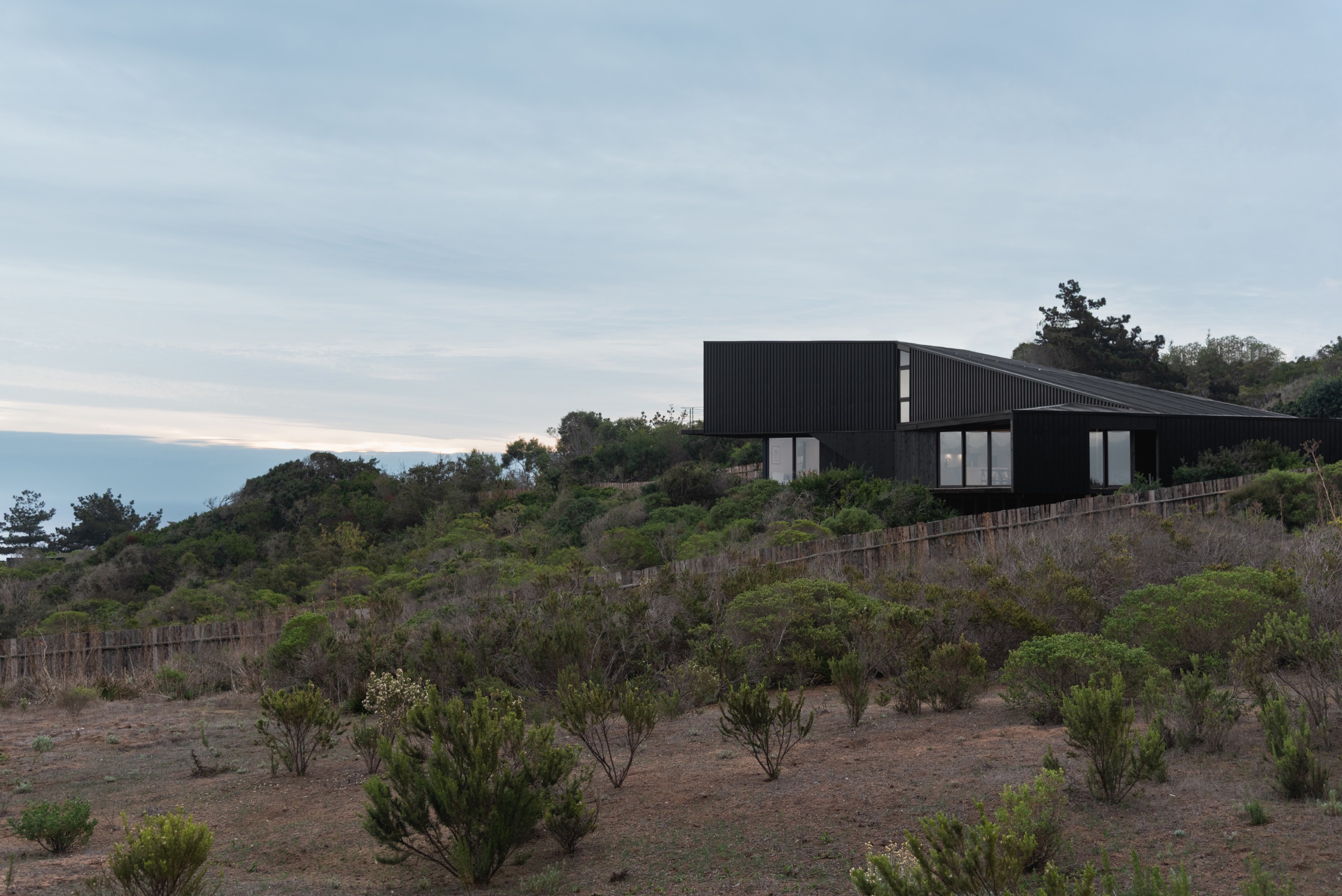 Casa Asomada by Whale!, a chilean house jutting out from a cliff towards the landscape