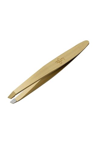 A pair of Sania's Brow Bar Slant Tip Tweezers set against a white background.