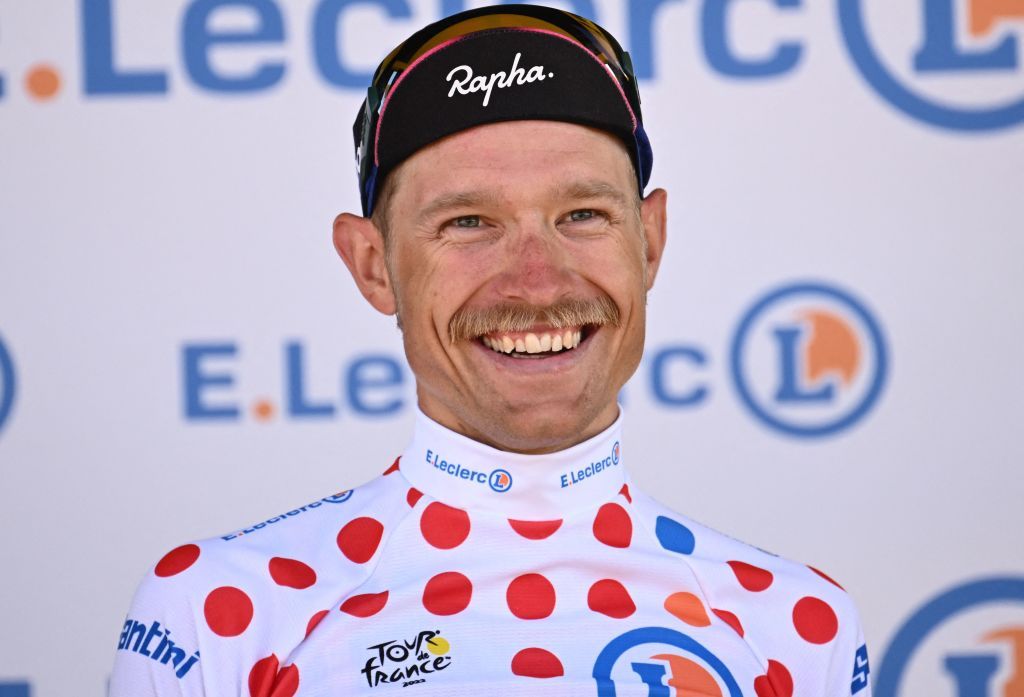 EF EducationEasypost teams Danish rider Magnus Cort Nielsen celebrates with the climbers dotted jersey on the podium after the 2nd stage of the 109th edition of the Tour de France cycling race 2022 km between Roskilde and Nyborg in Denmark on July 2 2022 Photo by Marco BERTORELLO AFP Photo by MARCO BERTORELLOAFP via Getty Images