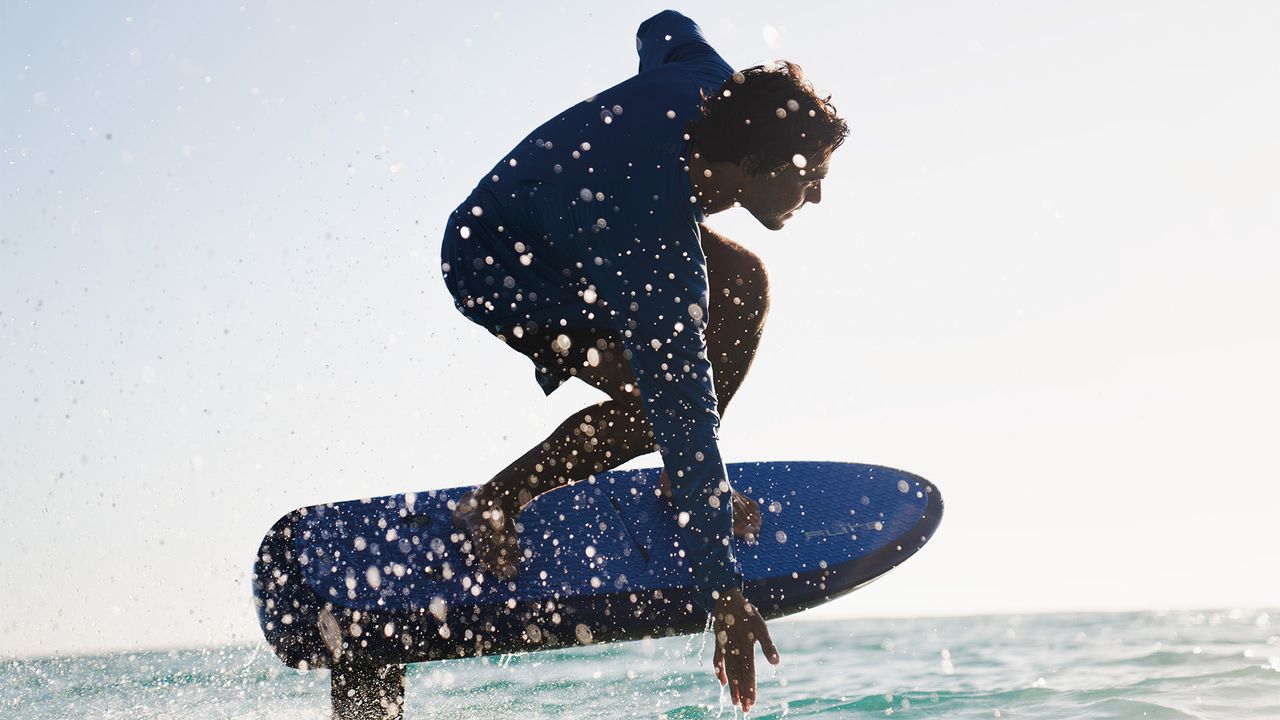 People riding Fliteboard eFoils on water