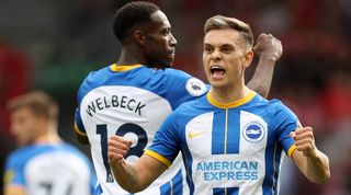 Leandro Trossard celebrates one of his goals for Brighton against Liverpool.