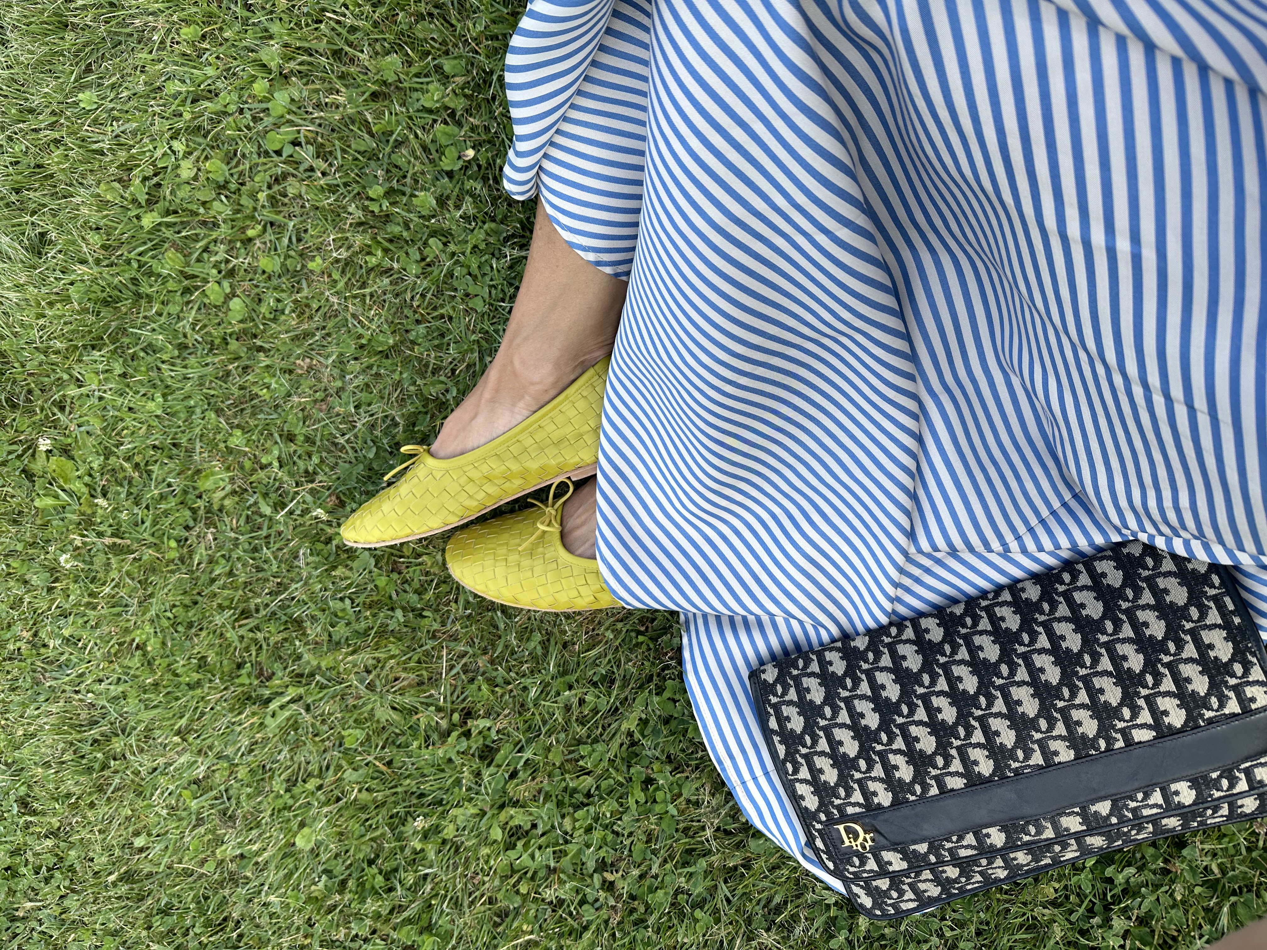 Larissa Mills wears lime green shoes for a pop of color