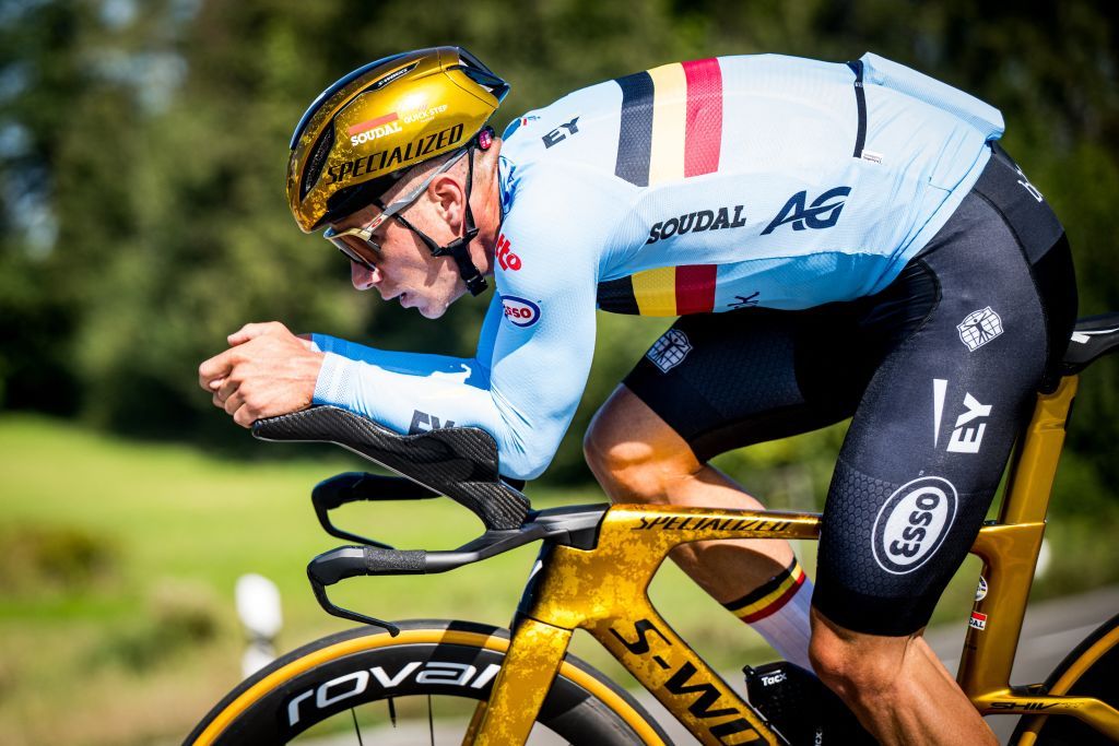 Remco Evenepoel trains on his new golden Specialized TT bike ahead of the 2024 UCI Road World Championships