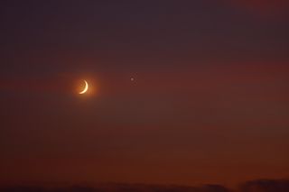 Ben Nevills captured this photo of the moon and Venus over Worthington, Indiana. He took the image with a Canon 40D and Canon 100-400 mm lens on Sept. 8. “The weather was very humid and a slight layer of clouds didn’t make for a very clear picture, but did add a little color,” Nevills wrote SPACE.com in an email.