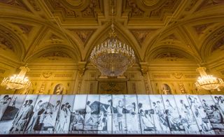 In this room, a fashion mural looks perfectly at home in its grandiose surrounds