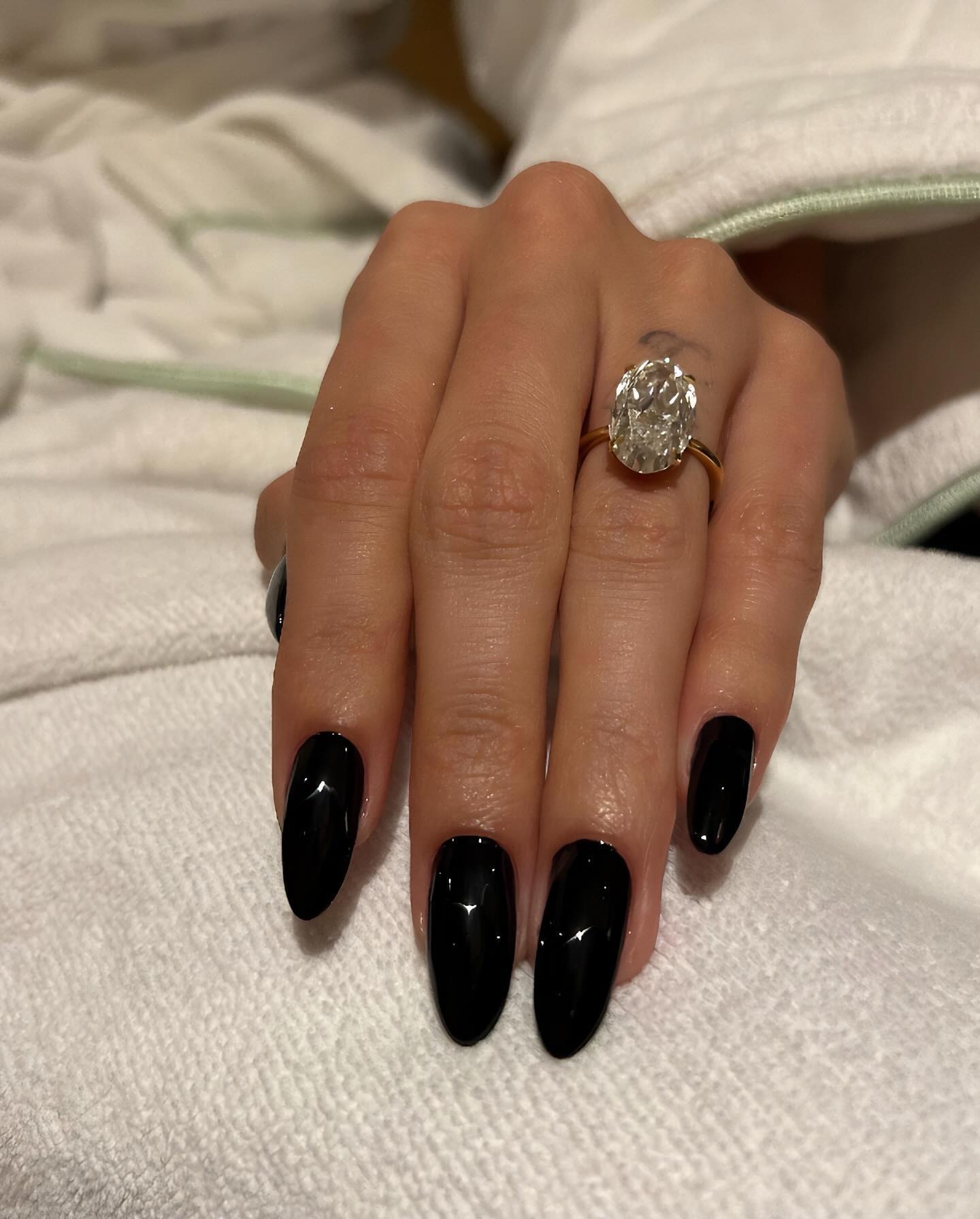 Photo of Hailey Bieber wearing OPI nail polish
