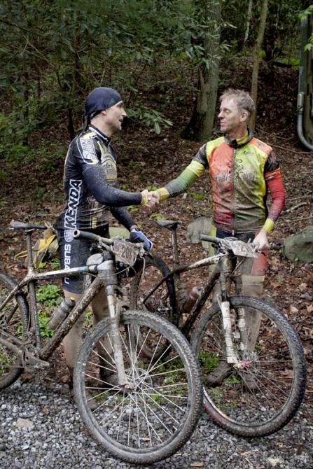 Masters third place David Jolin of Bellville, Ohio congratulates masters second place Roger Sutton, of Ocala, Florida