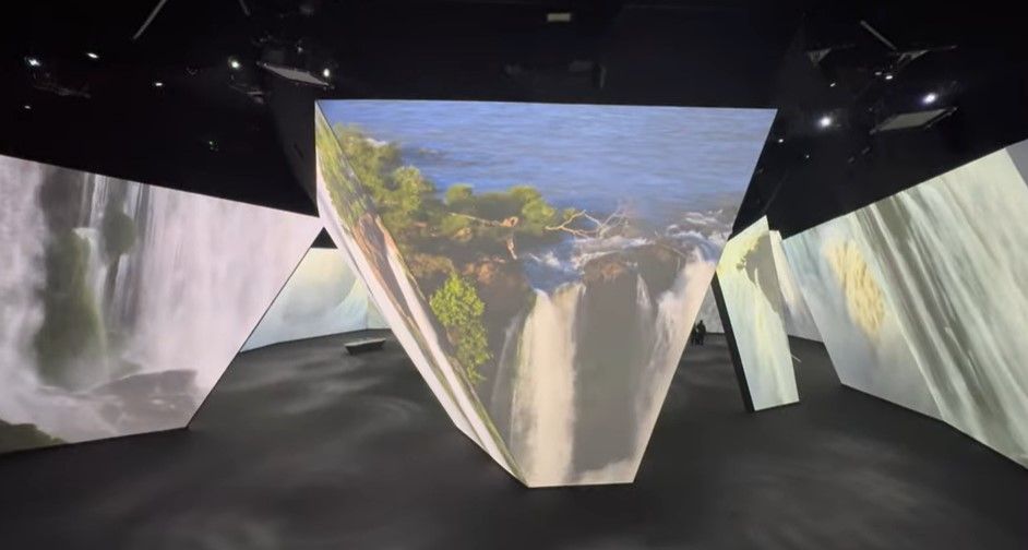 Waterfalls are projected onto multi-angle screens at the BBC immersive experience.