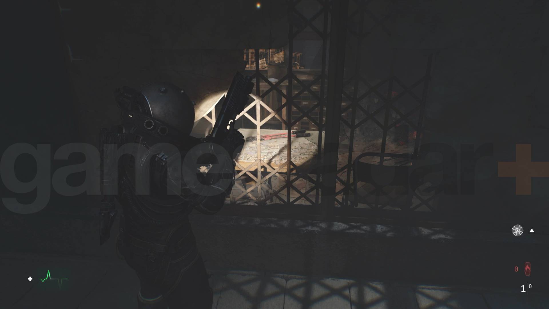 The bolt cutters visible through a window in Cronos