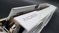 XFX Swift Radeon RX 9070 OC graphics card on a grey background with a gradient